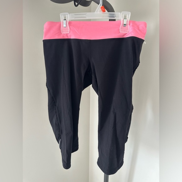 Lululemon Pink and Black Athletic Leggings with Stretchy Fabric - Picture 1 of 9